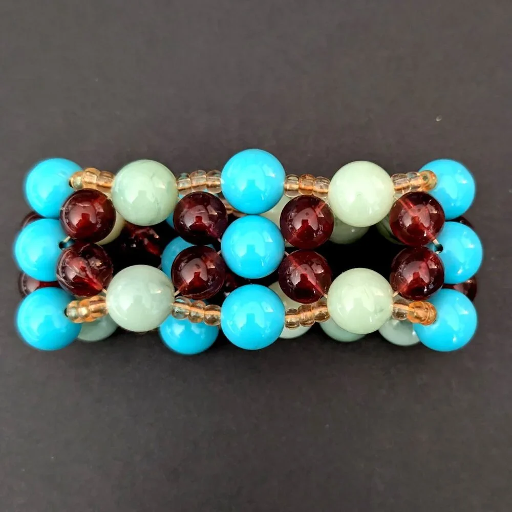 Blue, amber, green and pale yellow beaded stretch bracelet